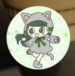 猫コーデのアイコンの見本画像、緑背景に左向きの女の子